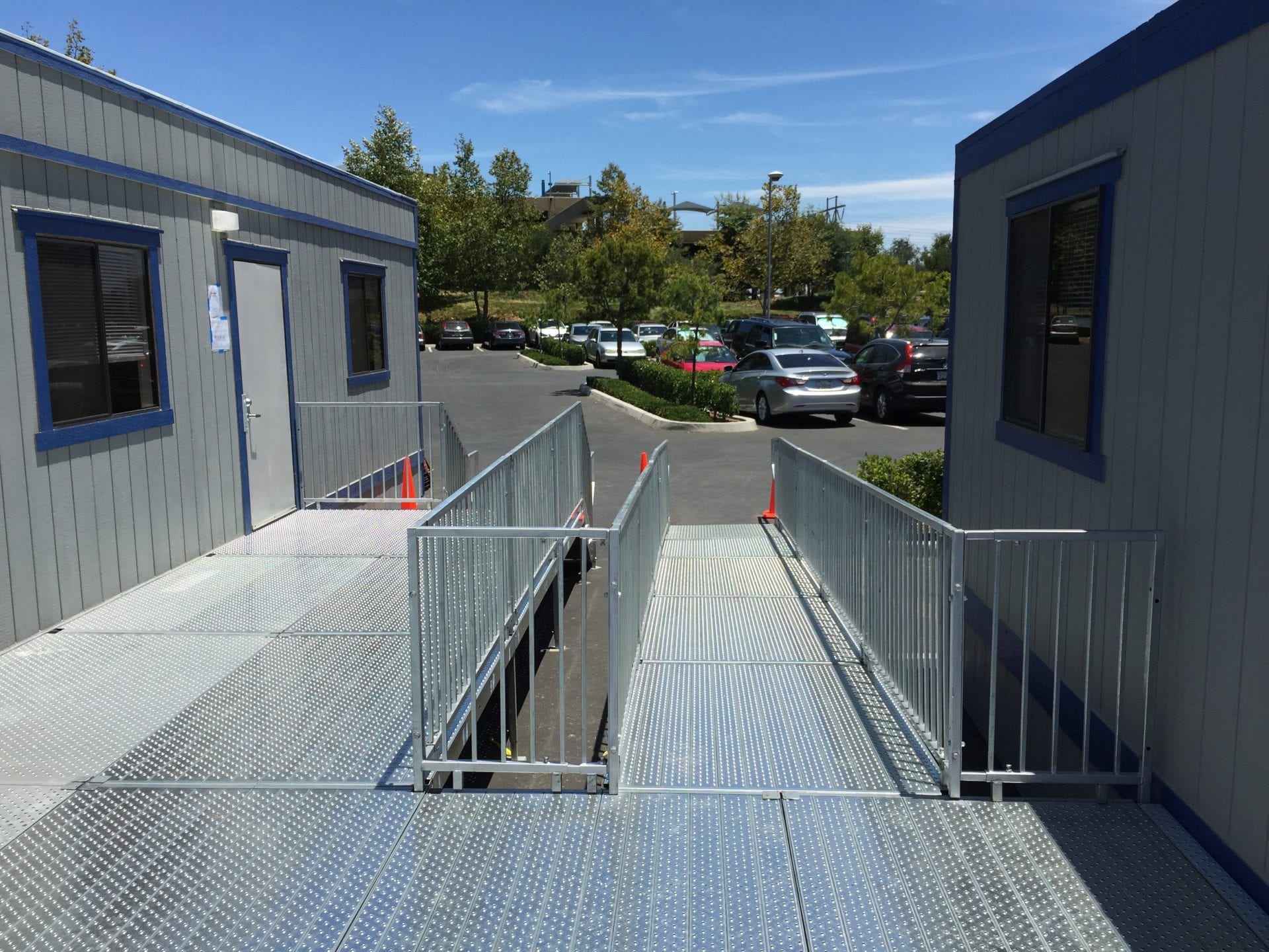 A ramp leading to the side of a building.