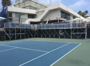 A tennis court with a blue and white court