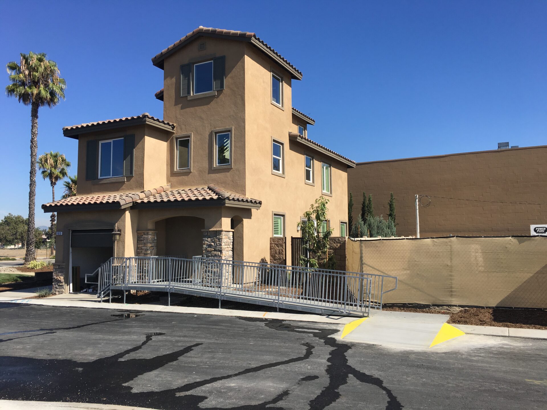 A building with a ramp in front of it.